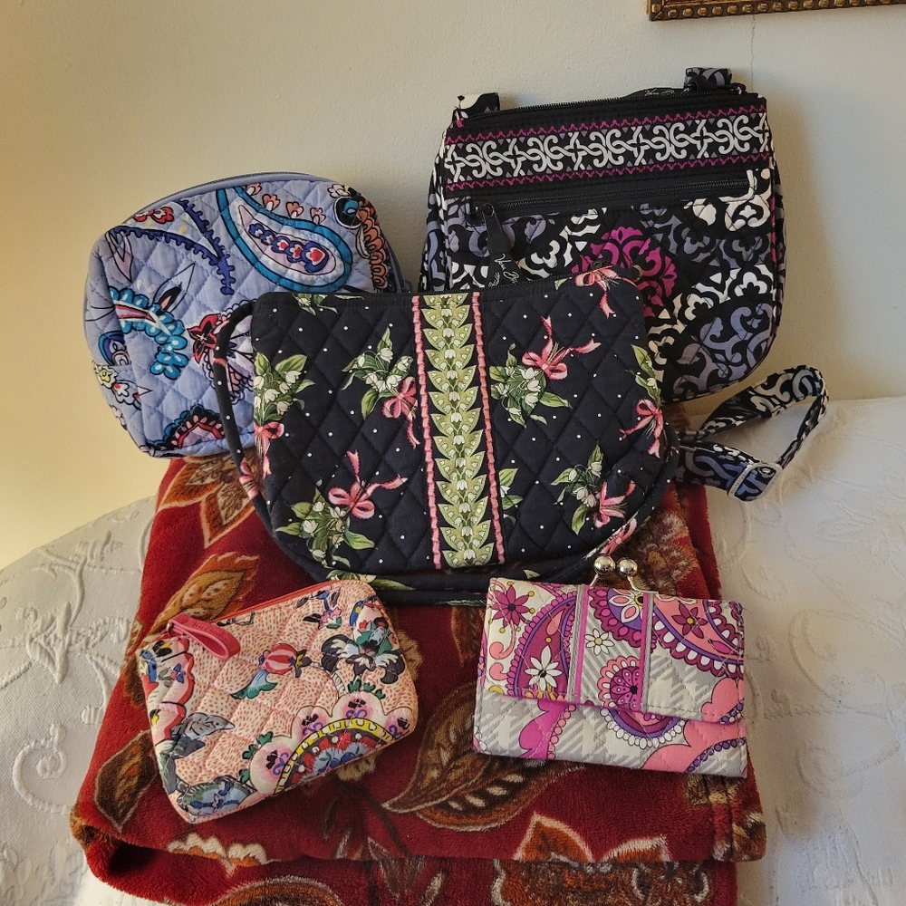 Vera Bradley 2 crossbodys bags. Cosmetic bag, change purse and wallet. Bundle